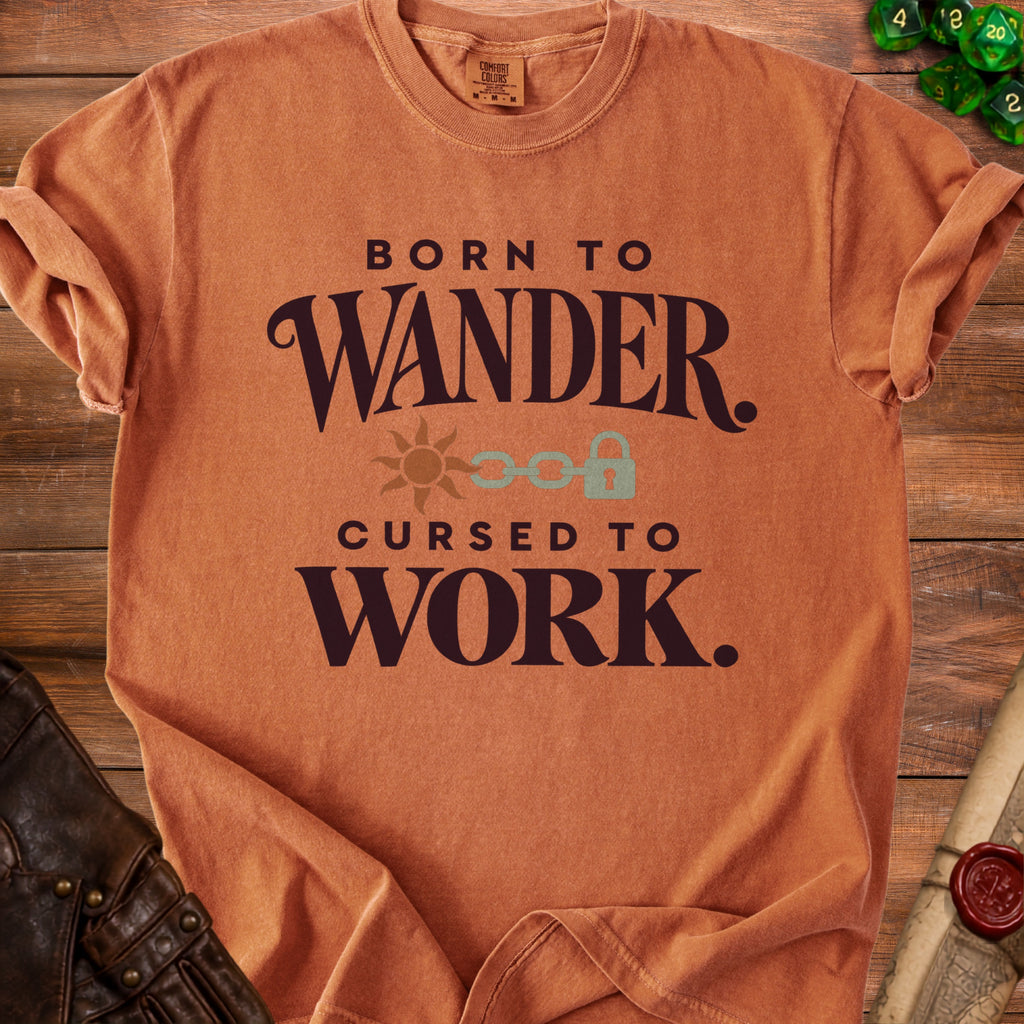 Orange t-shirt with text "BORN TO WANDER CURSED TO WORK."