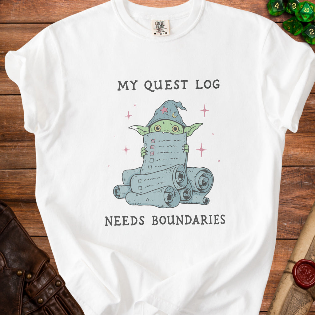 White t-shirt with a goblin holding a scroll and the text "MY QUEST LOG NEEDS BOUNDARIES".