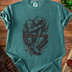Teal t-shirt with knight graphic and "I MISS MY BED" text.