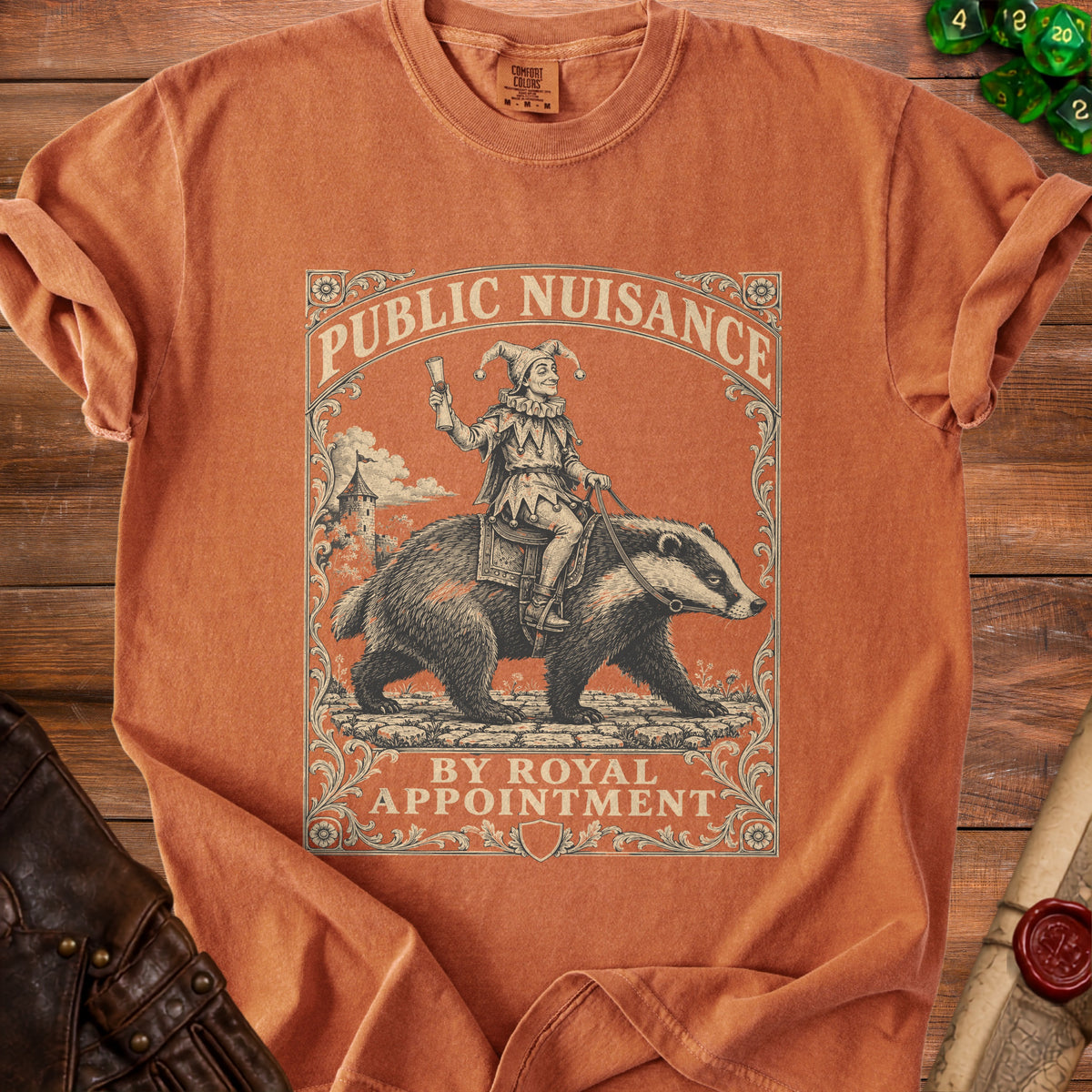 T-shirt with a jester riding a badger, reading "Public Nuisance by Royal Appointment".