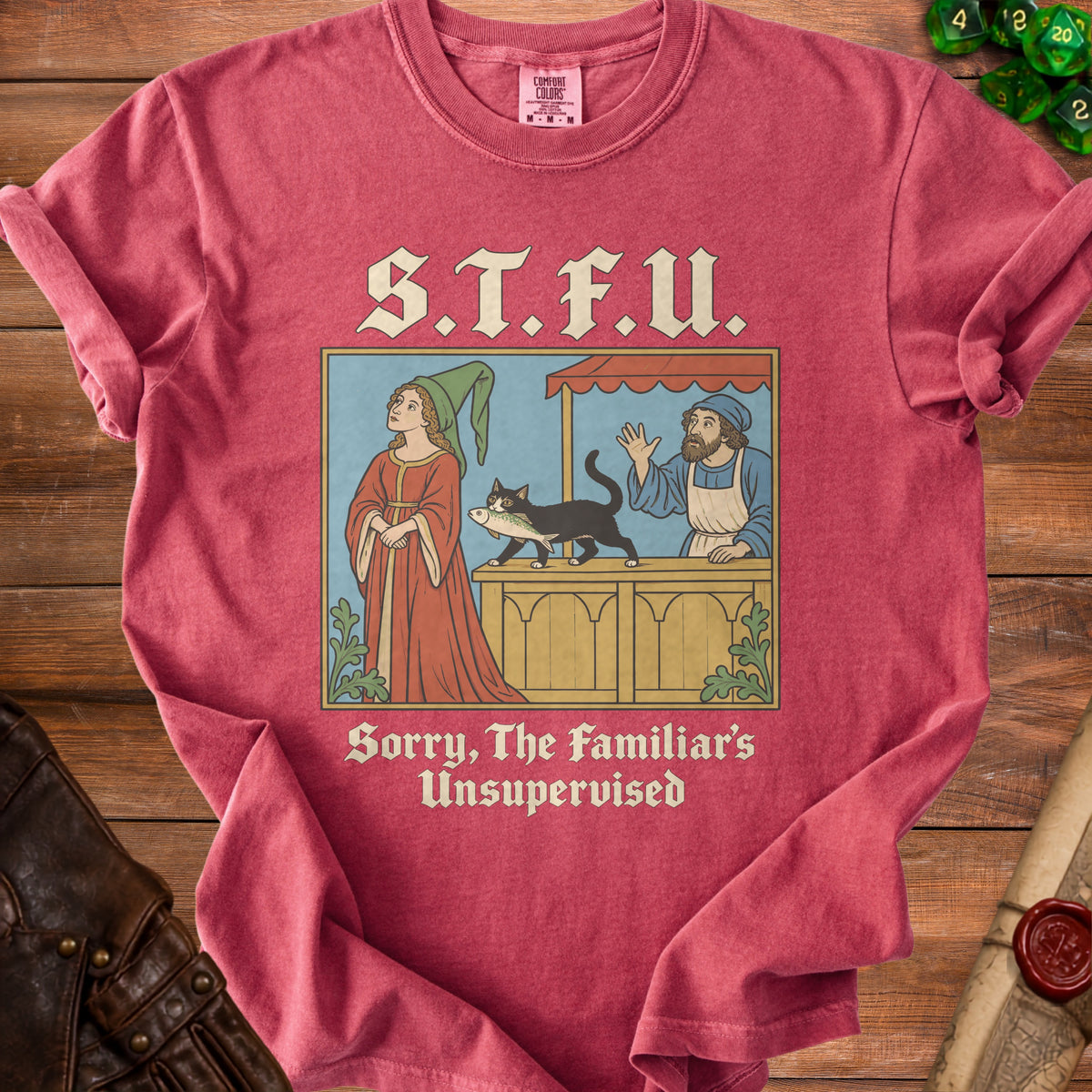 T-shirt with medieval art of a woman, cat with fish, and vendor with text S.T.F.U. Sorry, The Familiar's Unsupervised.