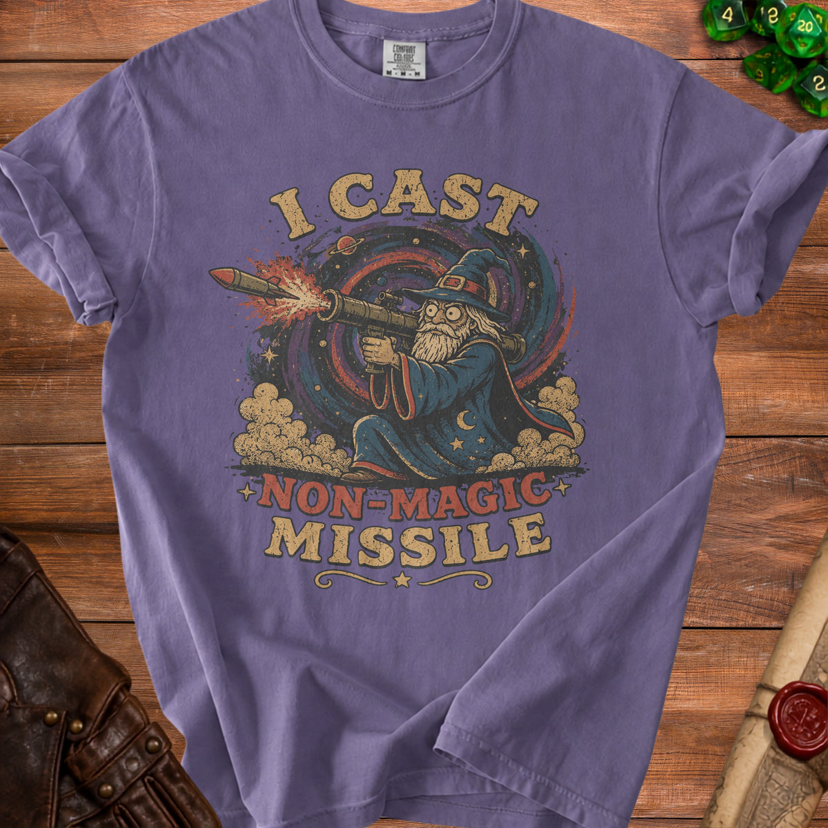Purple t-shirt with wizard firing a rocket launcher and text "I Cast Non-Magic Missile".