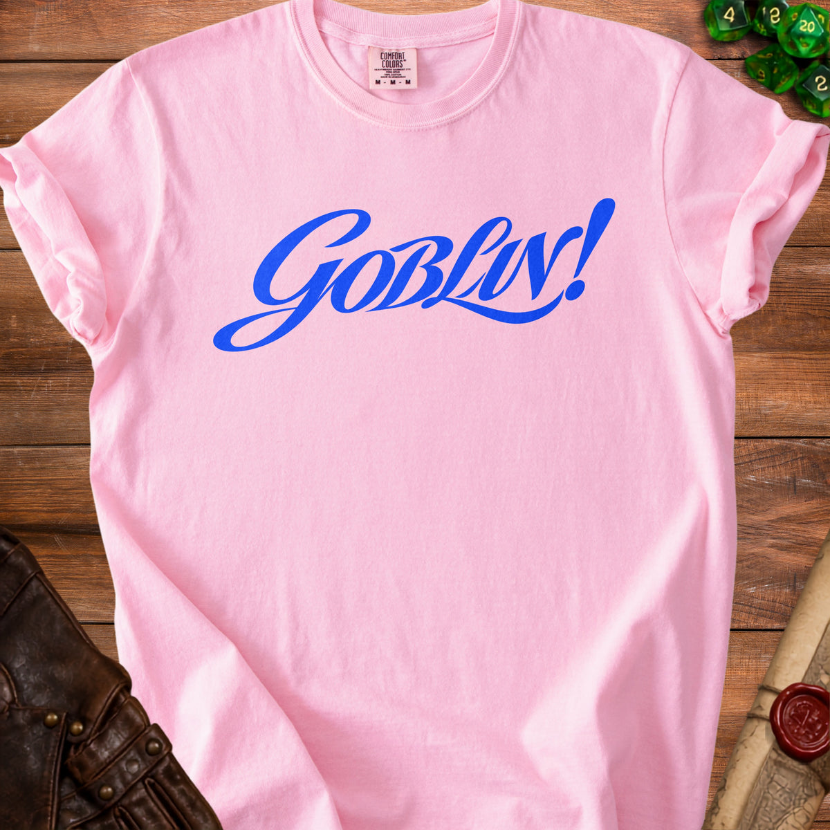 Pink t-shirt with blue "Goblin!" text and Comfort Colors tag.