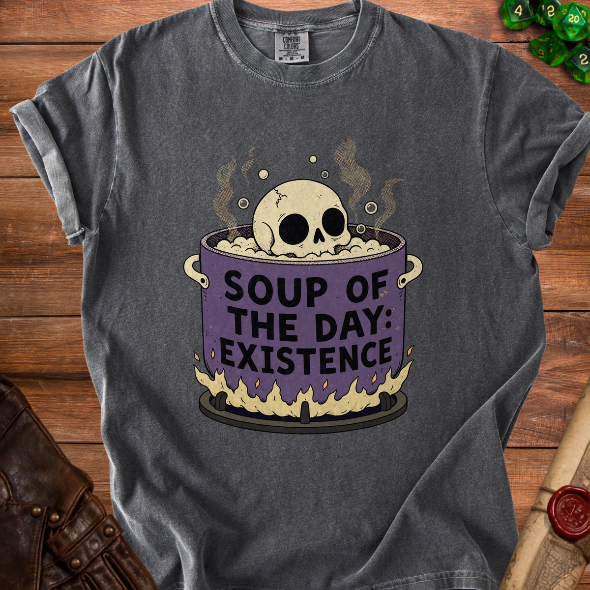 Dark gray t-shirt with a skull in a pot labeled "Soup of the Day: Existence".