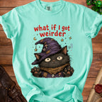 Aqua t-shirt with a black cat wearing a witch hat and the text "what if I got weirder".