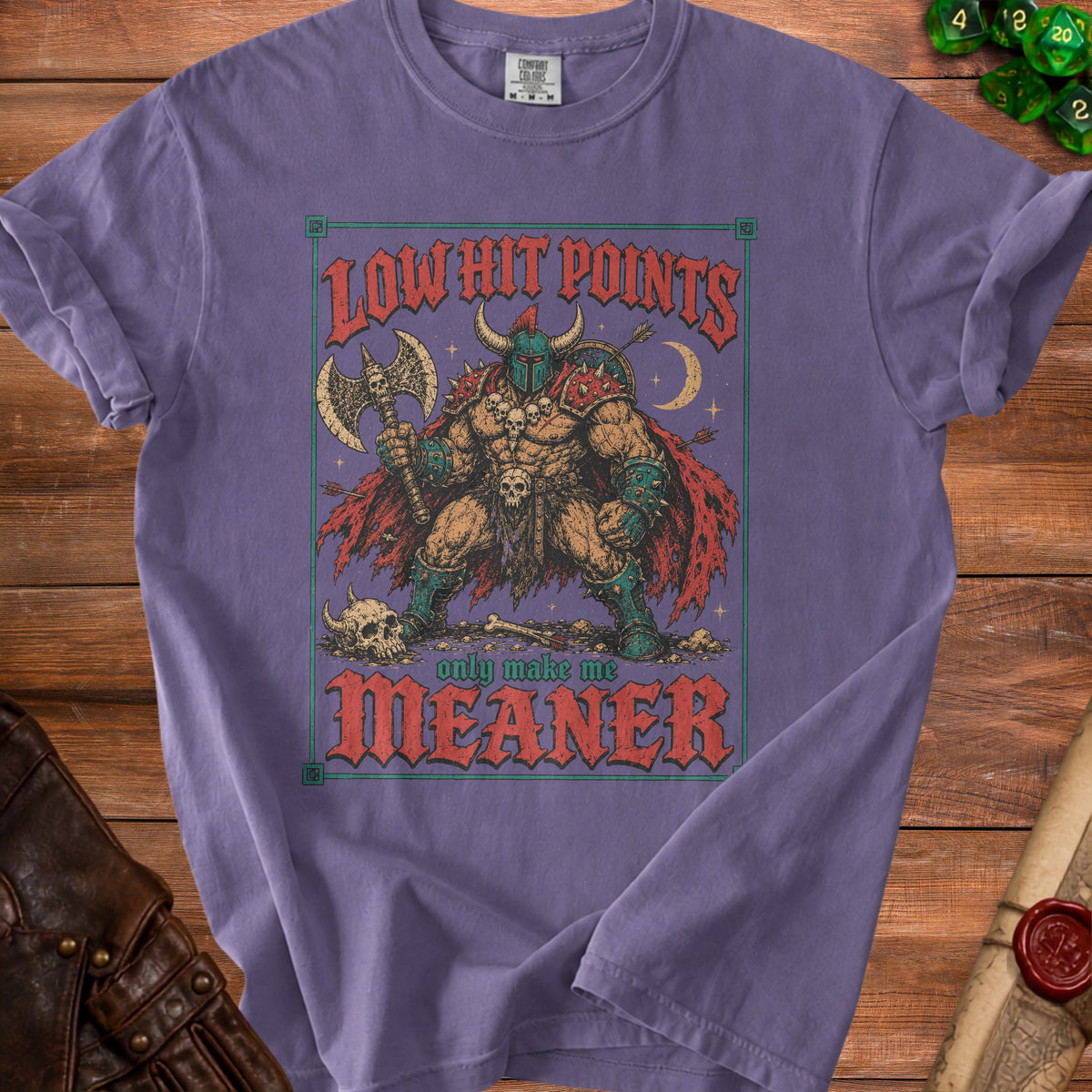 Purple t-shirt with "Low Hit Points Only Make Me Meaner" and a warrior illustration.