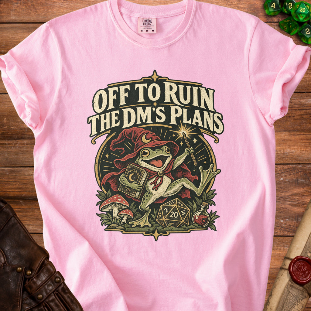 Pink t-shirt with graphic of wizard frog saying "Off to Ruin the DM's Plans".