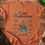 Goblin Manifestations text with a goblin sitting on coins and the phrase "i am wonderfully weird and proud".