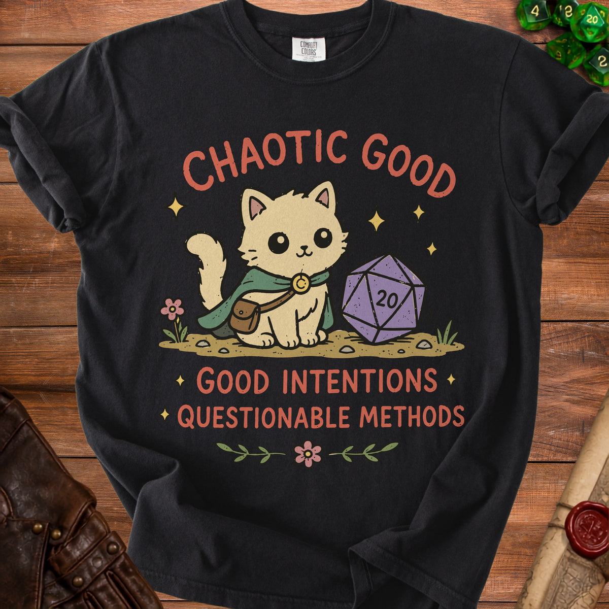 Black t-shirt with a cat, d20 die, and text: Chaotic Good, Good Intentions, Questionable Methods.