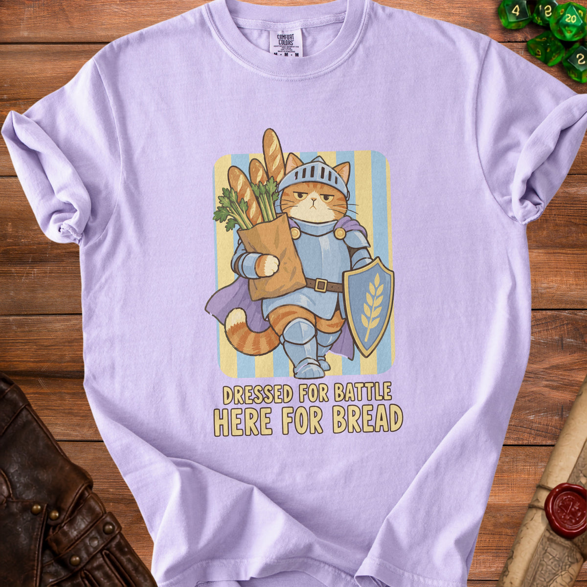 Cat in knight armor holds baguettes, text reads "Dressed for battle, here for bread."