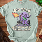Light blue t-shirt with "BIG TALK FOR SOMEONE IN FIREBALL RANGE" and a wizard graphic.