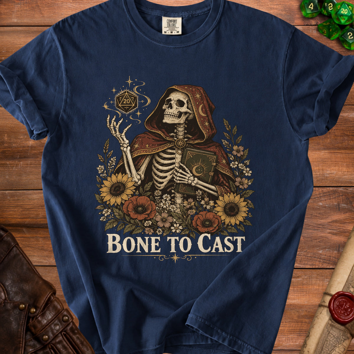 Skeleton in hooded robe holding a d20 die and book with text "Bone to Cast."