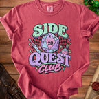 T-shirt with "SIDE QUEST CLUB" text, dice, sword, and potion graphic.