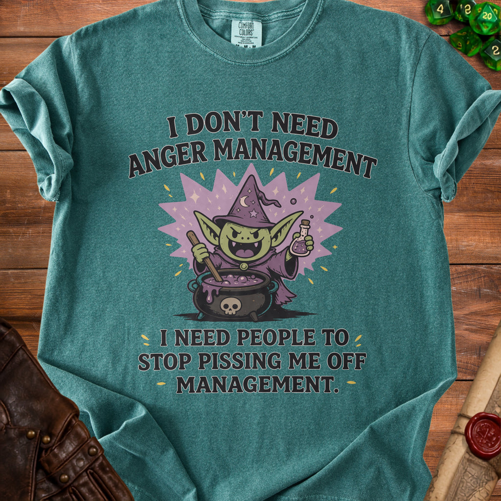 Teal t-shirt with a goblin character, cauldron, and text "I don't need anger management."