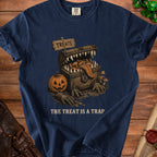 Dark navy t-shirt with Halloween graphic of a monster chest and text "The Treat Is A Trap".