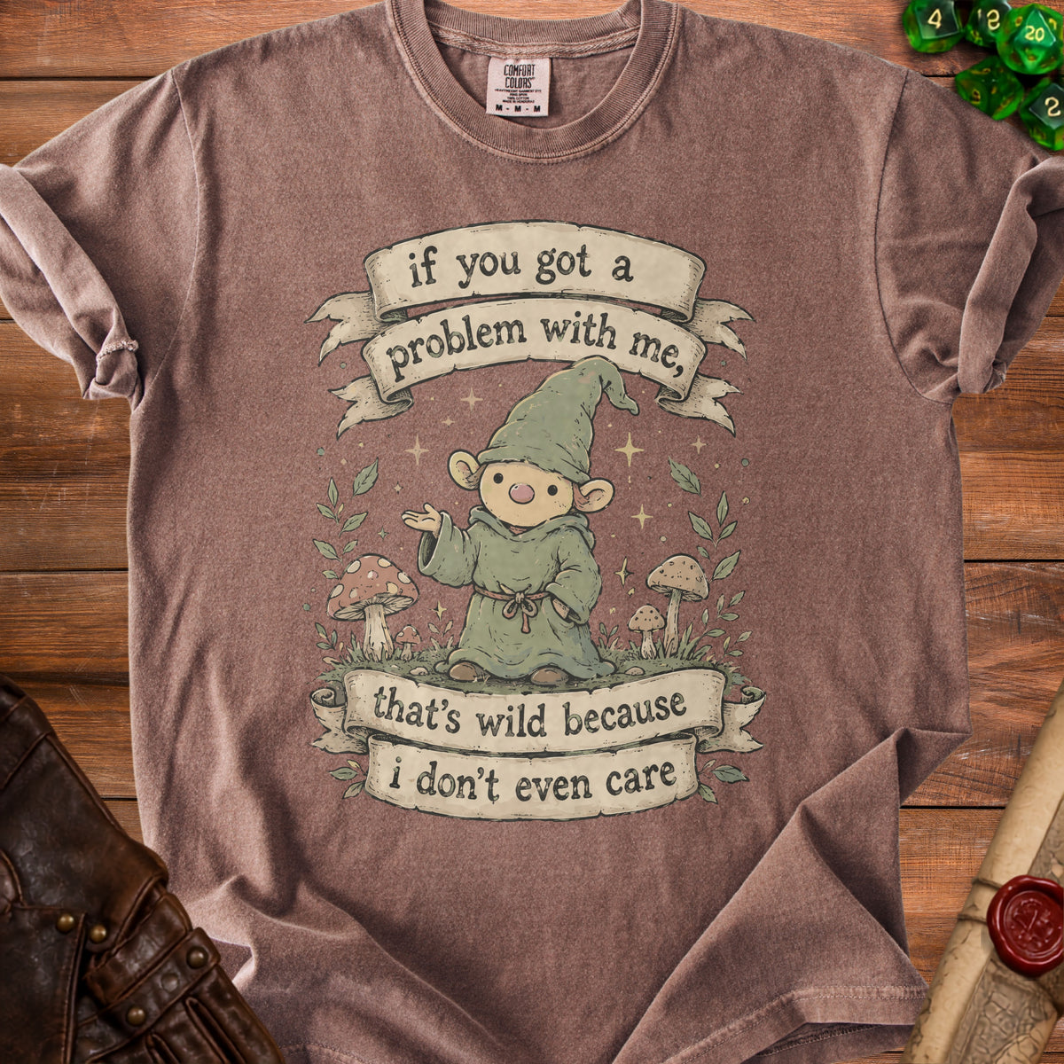 Brown t-shirt with a gnome graphic reading "if you got a problem with me, that's wild because i don't even care."