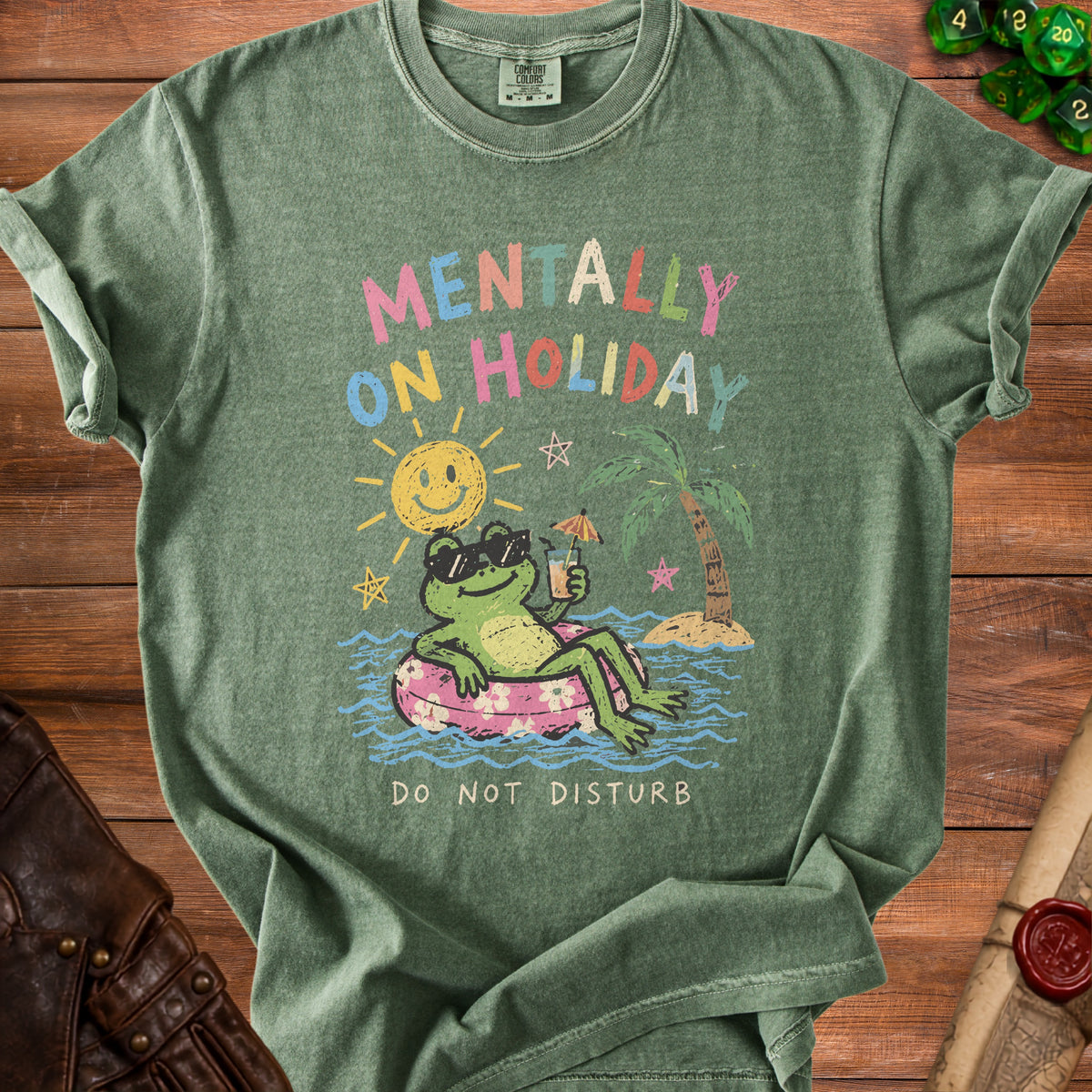 Green t-shirt with graphic of frog on float, text "Mentally On Holiday", and "Do Not Disturb".