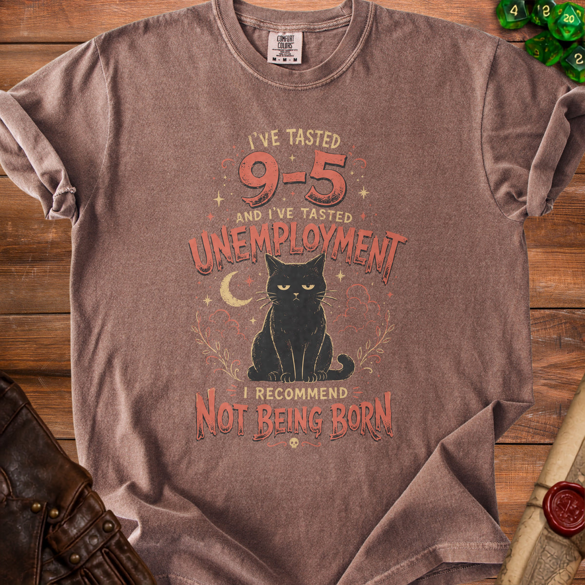 T-shirt with a black cat and text: "I've tasted 9-5 and unemployment. I recommend not being born."