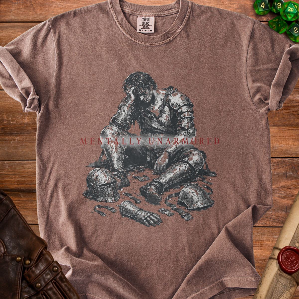Brown t-shirt with knight illustration and text "MENTALLY UNARMORED".