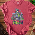 T-shirt with a wizard frog holding a mug and the word "Moist" in gothic font.