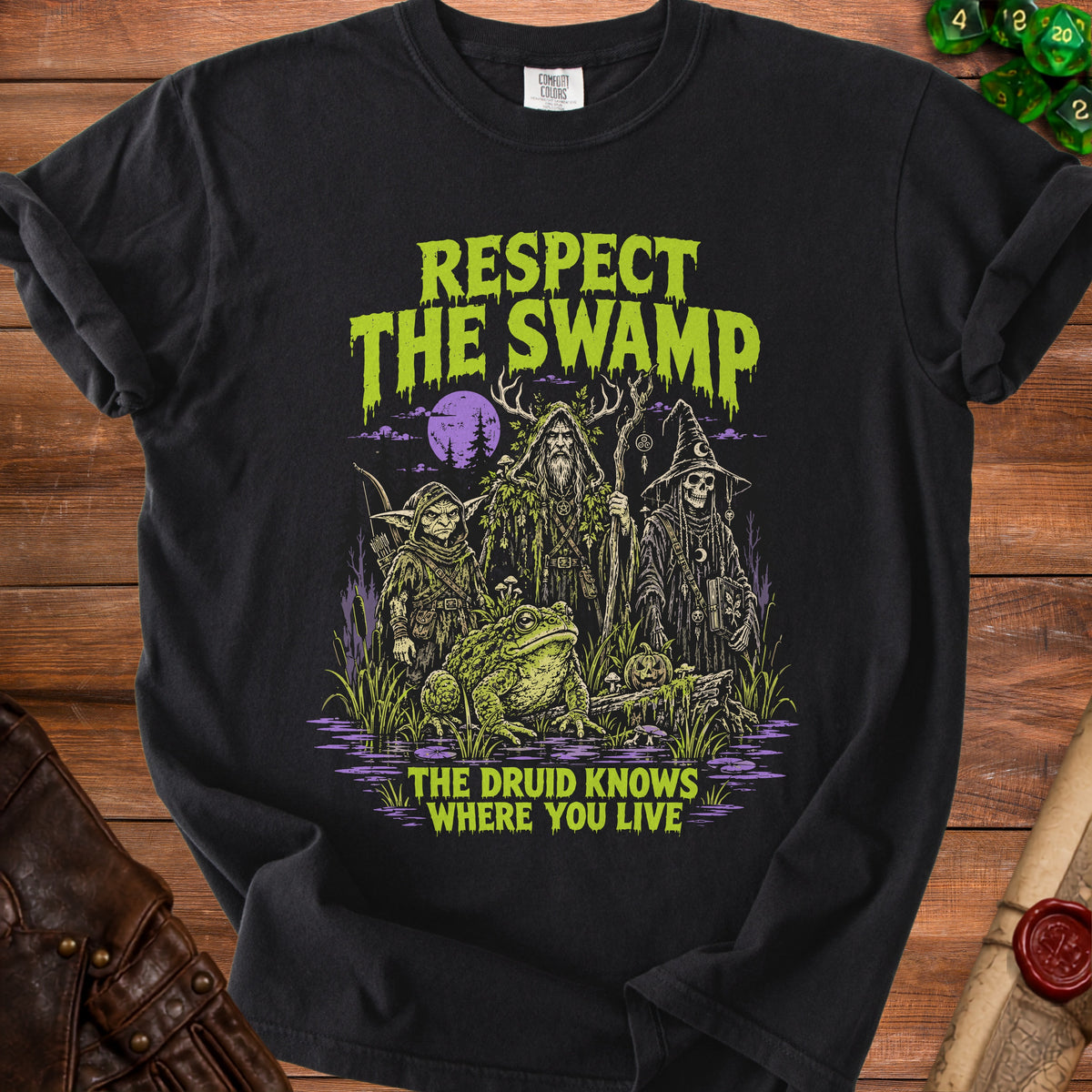 Black t-shirt with "Respect the Swamp" and "The Druid Knows Where You Live" text.