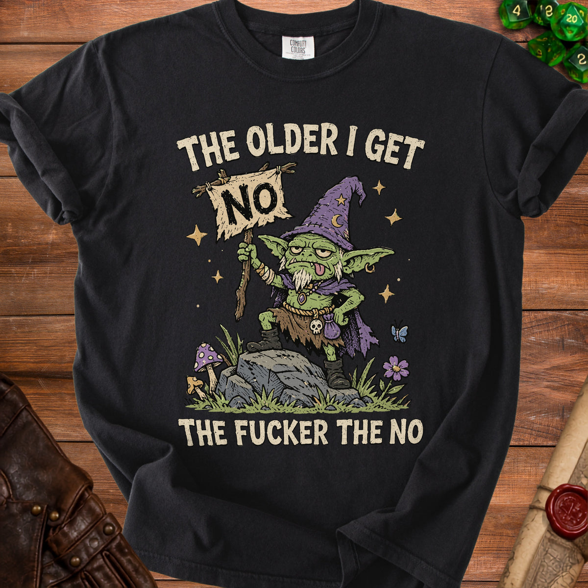 Black t-shirt with a green goblin holding a "NO" sign and text "THE OLDER I GET THE FUCKER THE NO".