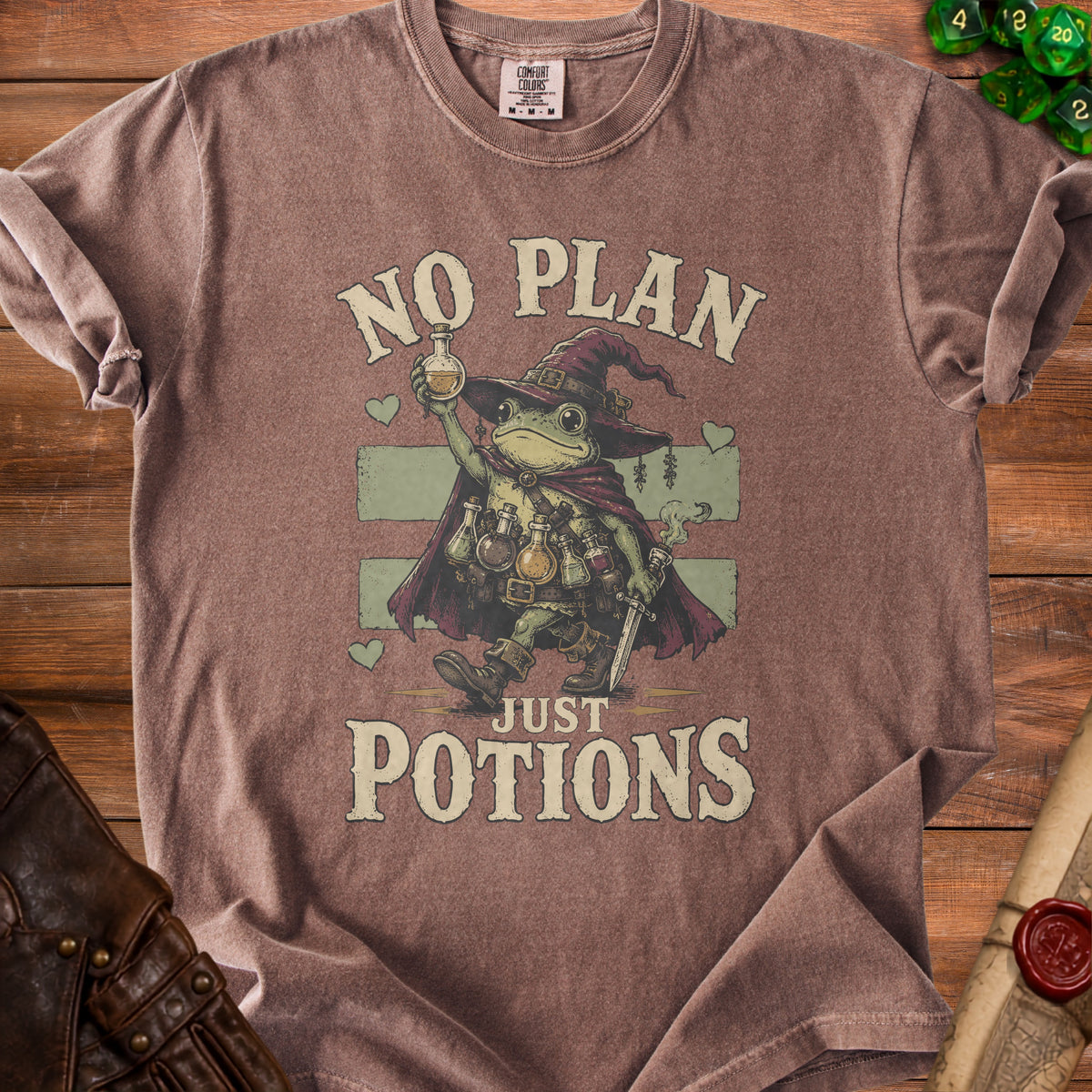 T-shirt with frog wizard illustration and "No Plan Just Potions" text.