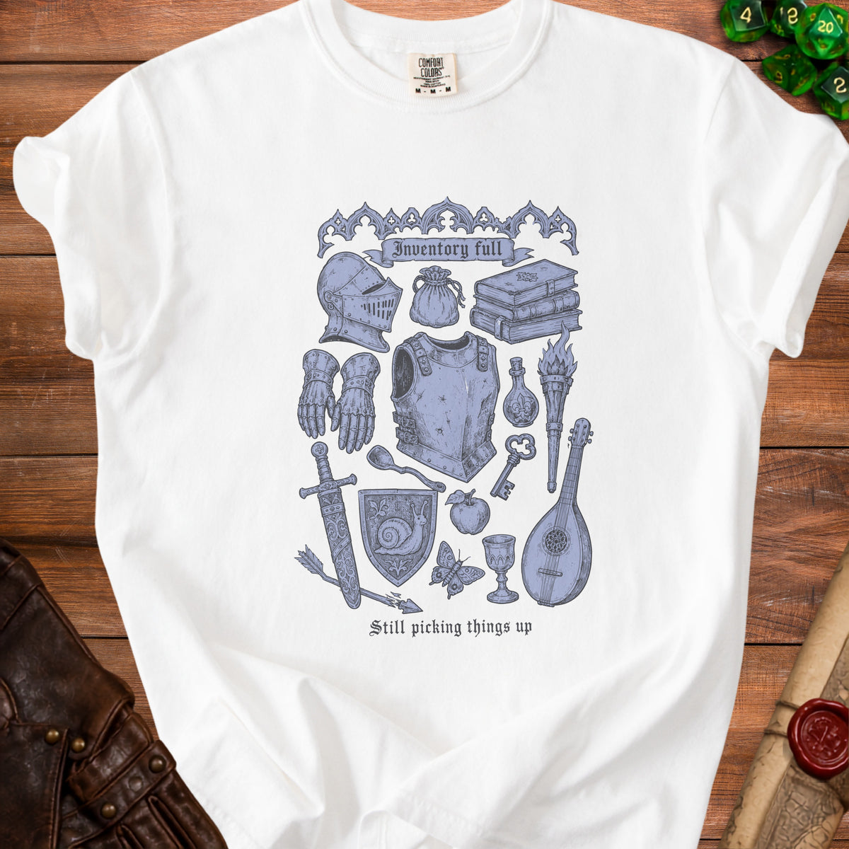 White t-shirt with a blue sketch of medieval items and text "Inventory full".