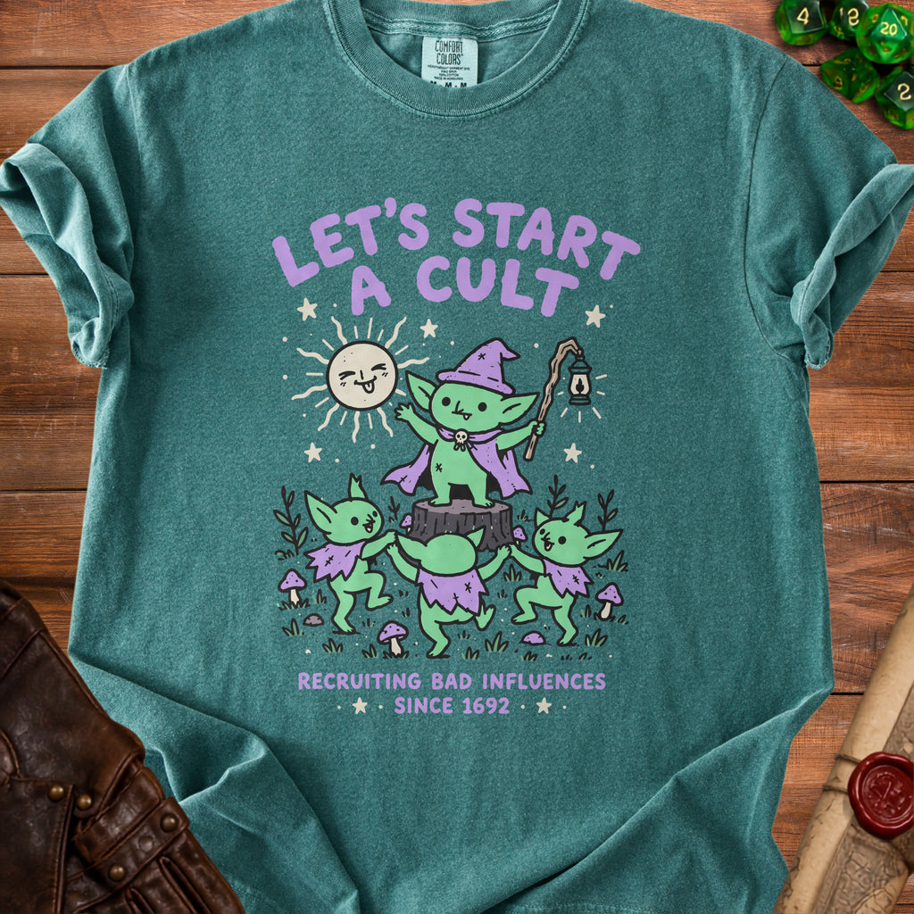 Green t-shirt with goblins and text "Let's Start a Cult. Recruiting Bad Influences Since 1692."