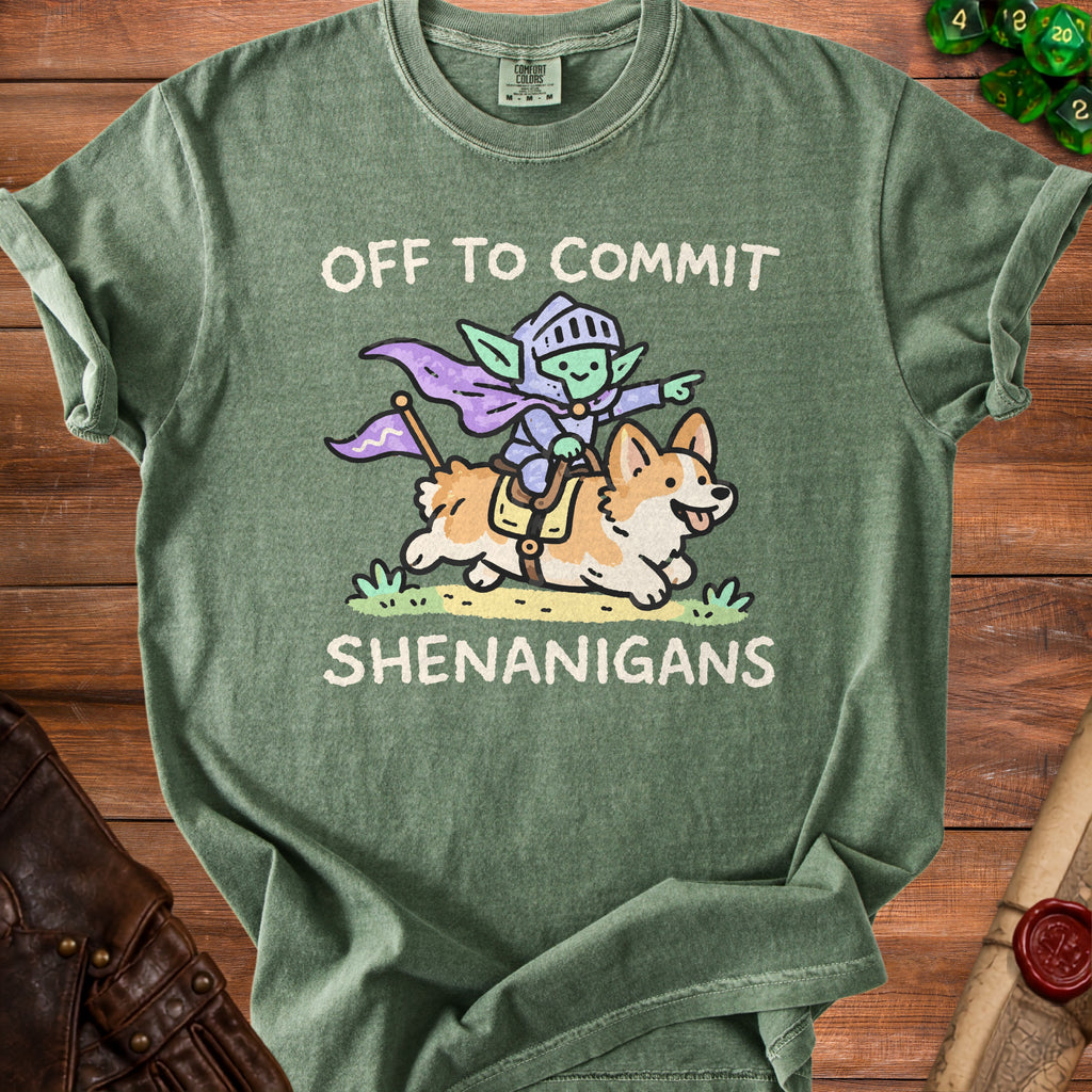 Green t-shirt with a goblin knight riding a corgi, text reads "OFF TO COMMIT SHENANIGANS".