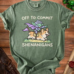 Green t-shirt with a goblin knight riding a corgi, text reads "OFF TO COMMIT SHENANIGANS".
