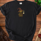 Black t-shirt with a cartoon wizard holding a steaming mug of coffee.