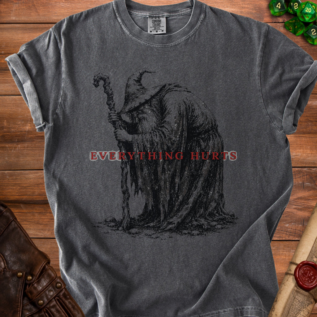 Dark t-shirt with a distressed wizard graphic and text "EVERYTHING HURTS".