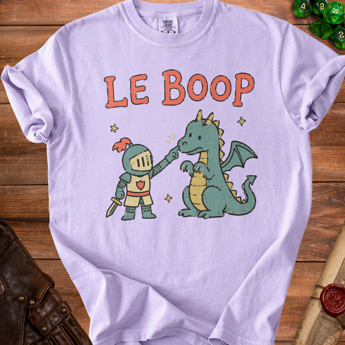 Light purple t-shirt with "LE BOOP" text and illustration of knight booping dragon.