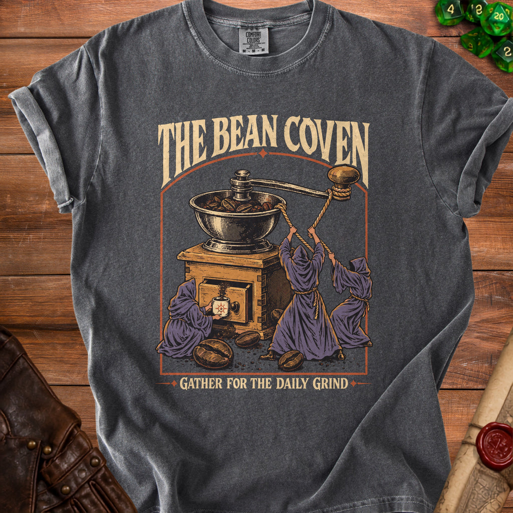 Dark t-shirt with "The Bean Coven" and "Gather for the Daily Grind" text.