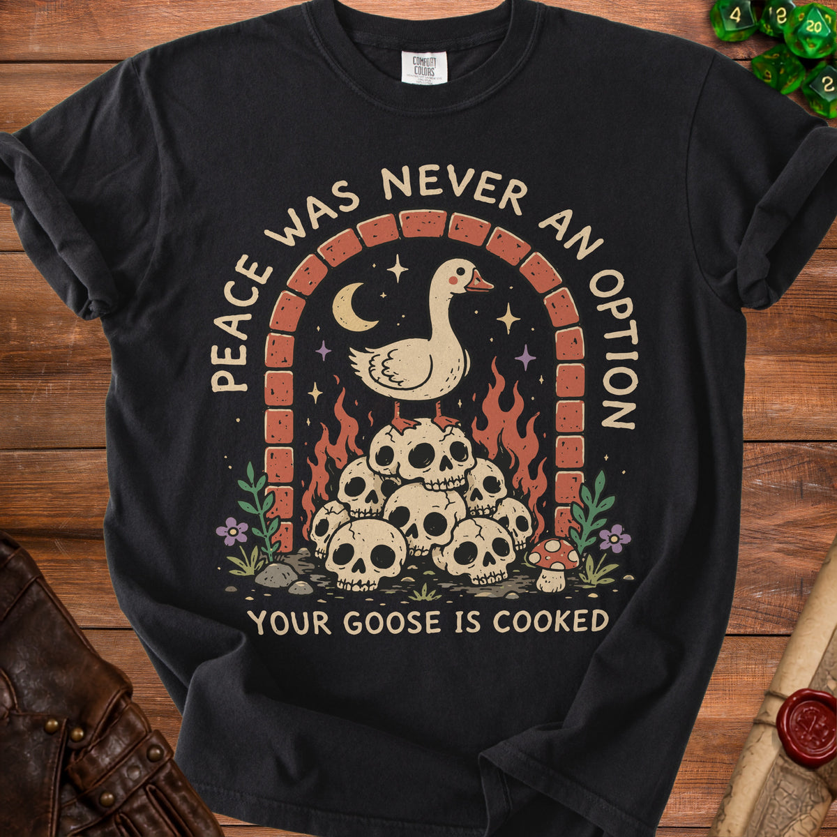 Black t-shirt with goose on skulls, moon, and flames; "Peace Was Never An Option Your Goose Is Cooked."