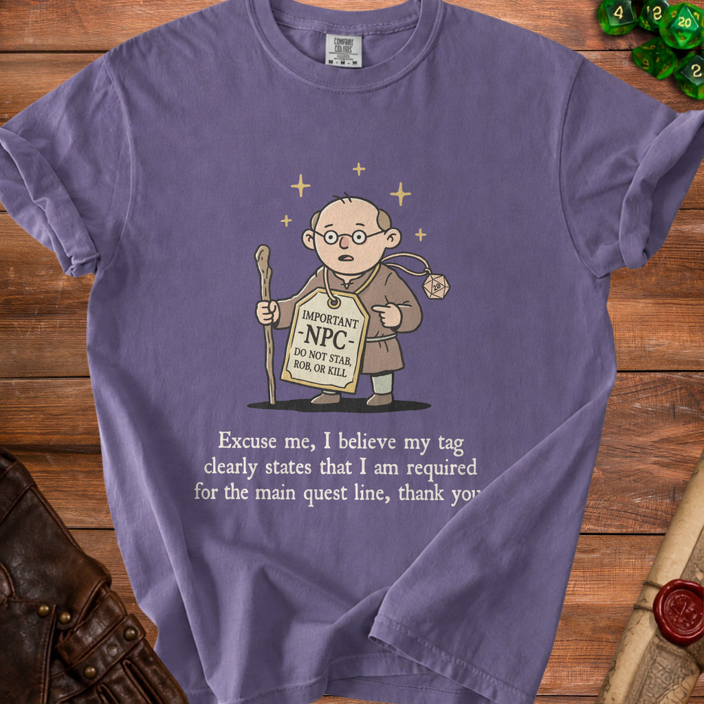 Purple t-shirt with cartoon monk graphic and text about being an NPC.