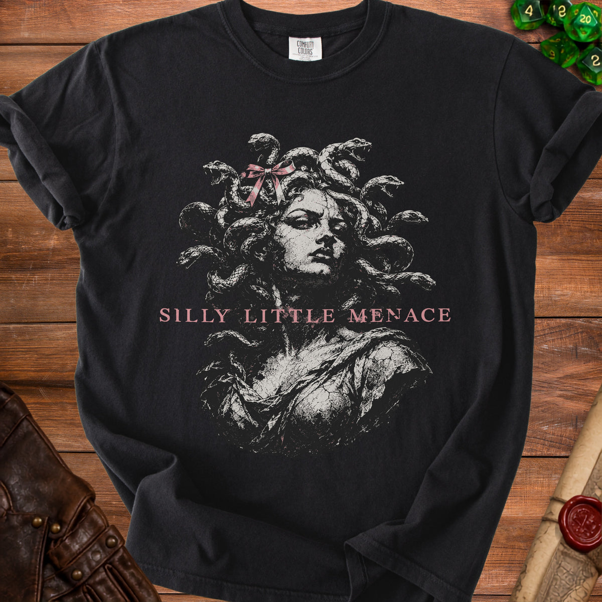 Black t-shirt with Medusa graphic and "Silly Little Menace" text.