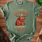 Green t-shirt with a cartoon demon holding a mug that says "Please Summon Someone Else."