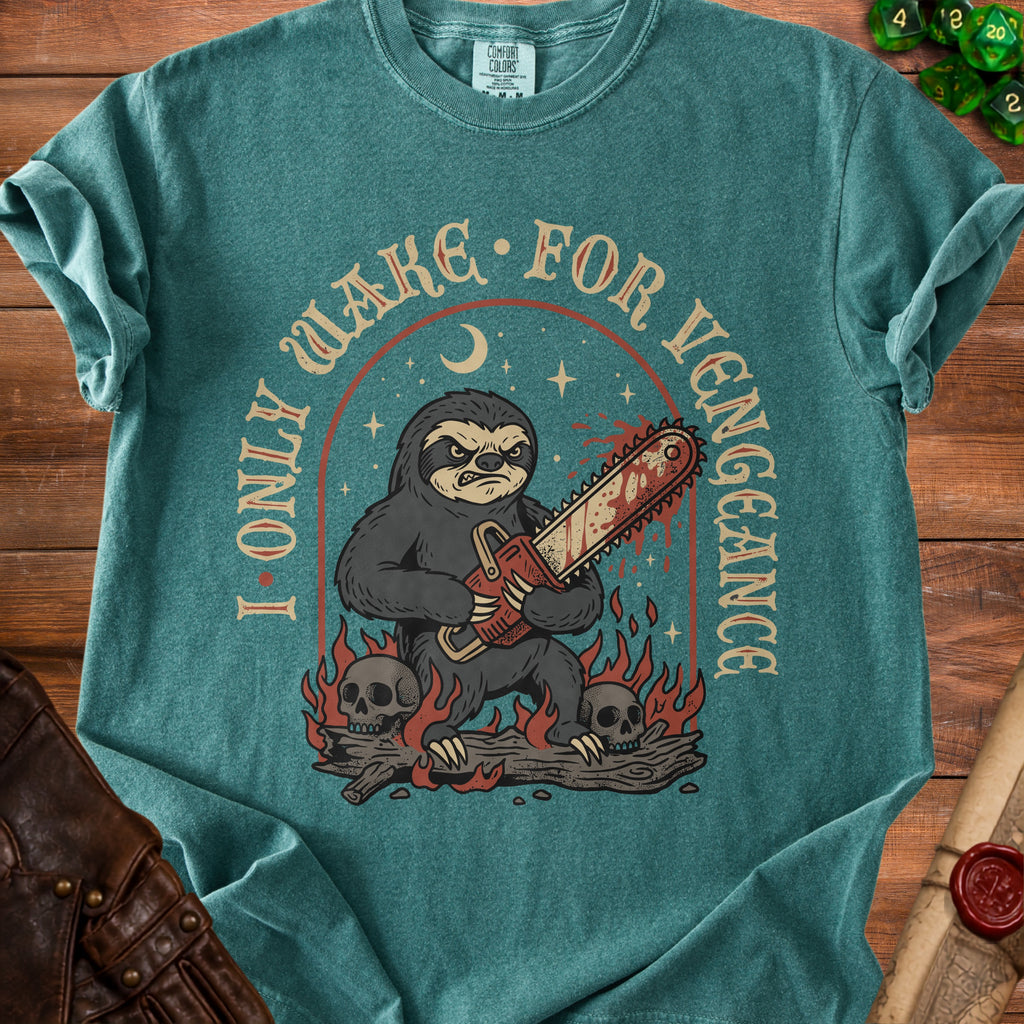 Graphic tee with a menacing sloth holding a bloody chainsaw, surrounded by skulls and flames. Text reads "I ONLY WAKE FOR VENGEANCE".