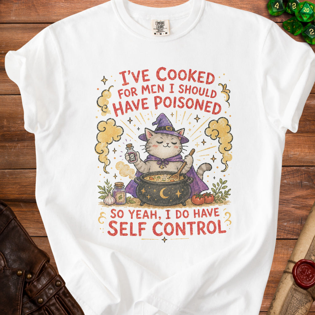 White t-shirt with a cat witch stirring a cauldron with the text "I've cooked for men I should have poisoned".