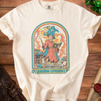 Cream t-shirt with a retro graphic of a young wizard and a dragon, "Learning Experience" text.