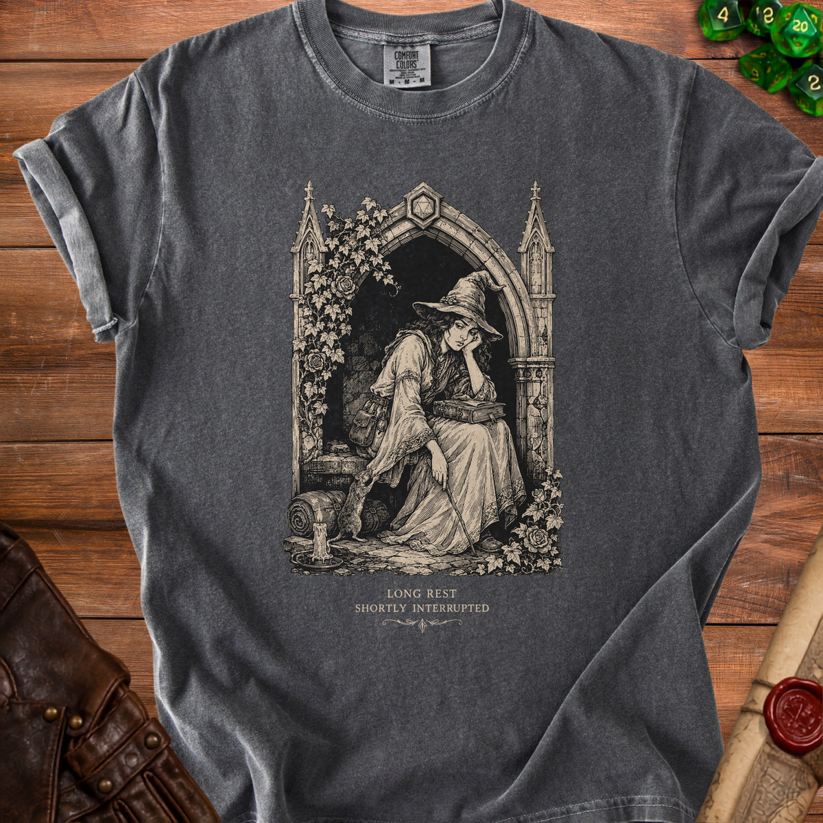 Charcoal t-shirt with a vintage illustration of a witch resting, reading, and a rat.