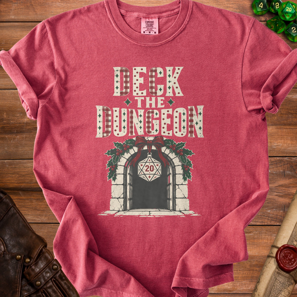 Red t-shirt with "Deck the Dungeon" text and a d20 die ornament.