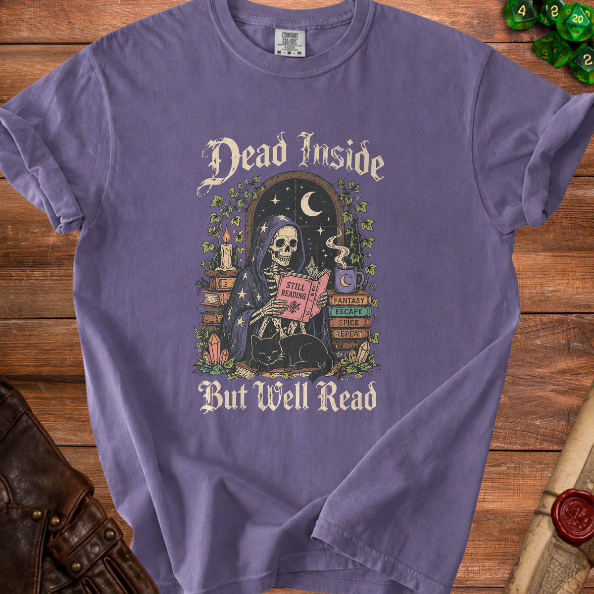 Skeleton reading a book with a cat, text "Dead Inside But Well Read".