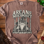 T-shirt with a frog wizard in jail design and "Arcane Misconduct" text.