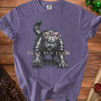 Purple t-shirt with armor-clad cat graphic and "CUTE BUT FER AL" text.
