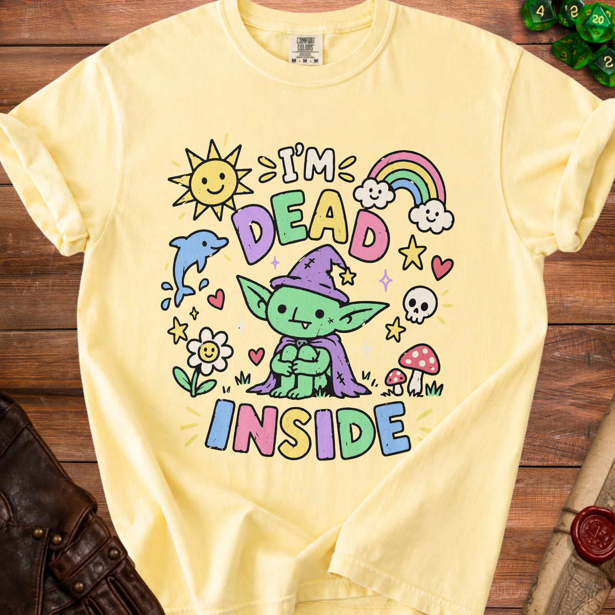 Yellow t-shirt with a green creature saying "I'M DEAD INSIDE" and cartoon elements.