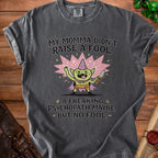 Dark grey t-shirt with a graphic of a goblin holding a knife and the text "My Momma Didn't Raise A Fool".