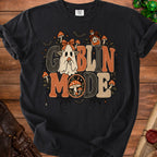 Black t-shirt with "Goblin Mode" text featuring a cute ghost, mushrooms, bats, and potion.